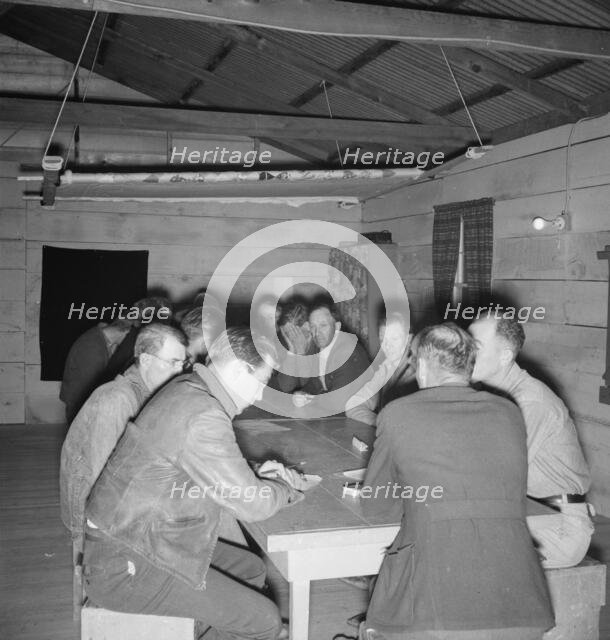 Meeting of the camp council, FSA camp, Farmersville, California, 1939. Creator: Dorothea Lange.