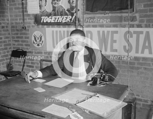 Air raid wardens' meeting in zone nine, Southwest area, Washington, D.C, 1942. Creator: Gordon Parks.