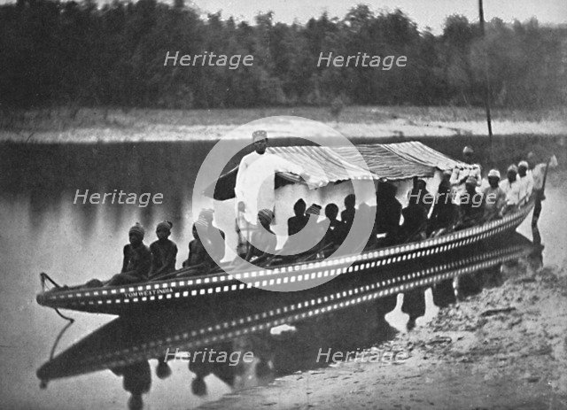 'Tom West India's' canoe, New Calabar, Southern Nigeria, 1912. Artist: Unknown.