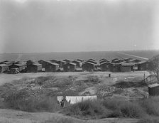Company housing for Mexican cotton pickers, South of Corcoran, California, 1936. Creator: Dorothea Lange.