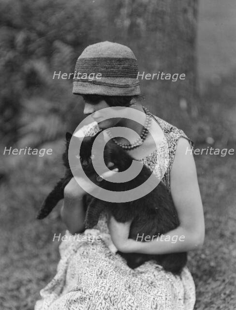 Elizabeth Duncan dancer, with cat, portrait photograph, 1926 Creator: Arnold Genthe.