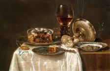 Olives in a blue and white porcelain bowl, a roemer, wine glasses, an overturned silver..., 1650s. Creator: Heda, Willem Claesz (1594-1680).