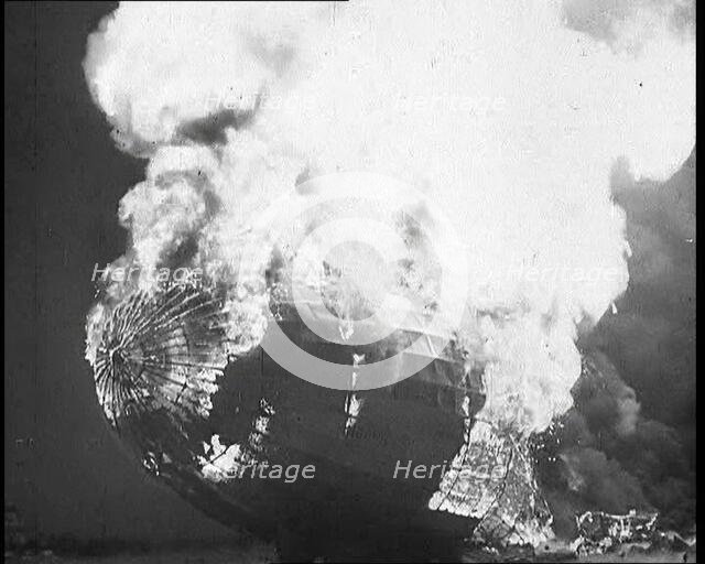 The German Airship, the Hindenburg, its Rear Half Destroyed And Obscured By Smoke With..., 1937. Creator: British Pathe Ltd.