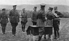 'Une ceremonie militaire a Salonique; Le general Sarrail decore par le general Mahon..., 1916. Creator: Unknown.