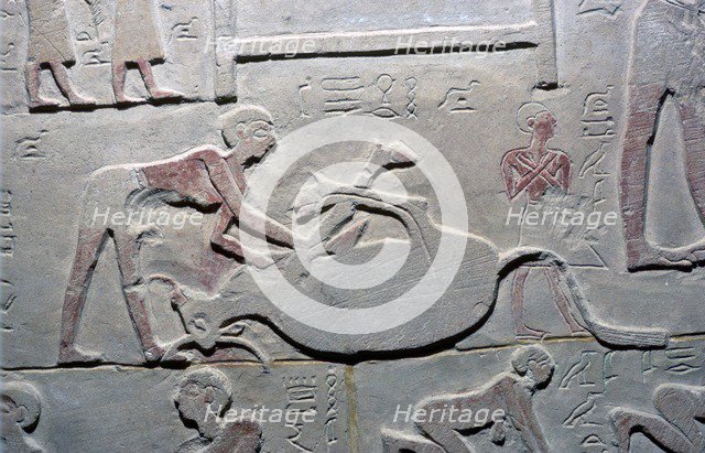 Egyptian relief of the cutting up of a carcass. Artist: Unknown