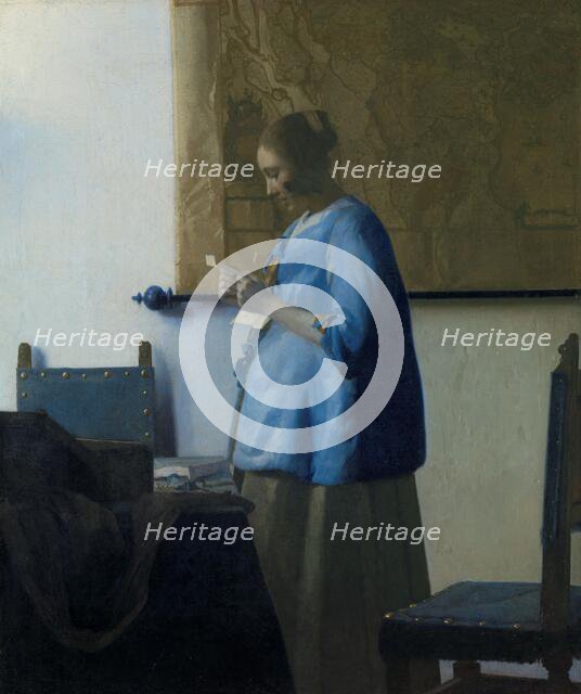 Woman Reading a Letter, c.1663. Creator: Jan Vermeer.