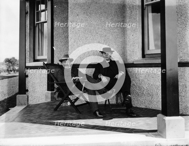 Lloyd George resting on the verandah of a house. Artist: Unknown