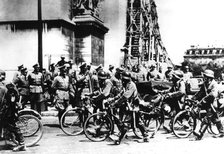 German soldiers marching past the Arc de Triomphe, Paris, 14 June 1940. Artist: Unknown