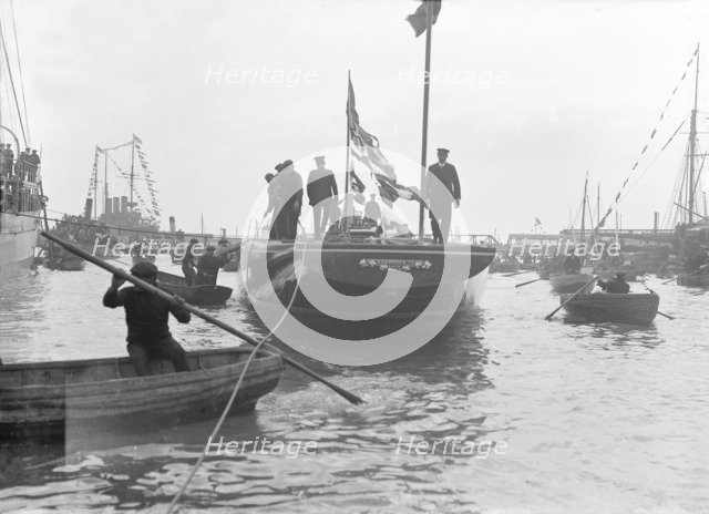 The launch of 'Shamrock IV' at Gosport, May 1914. Creator: Kirk & Sons of Cowes.