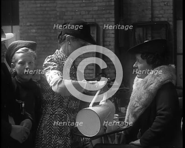 Dutch Refugees Having Tea at  a Reception Centre in the United Kingdom, 1940. Creator: British Pathe Ltd.