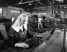 Female workers sharpening saw blades at Slack Sellars & Co, Sheffield, South Yorkshire, 1963. Artist: Michael Walters