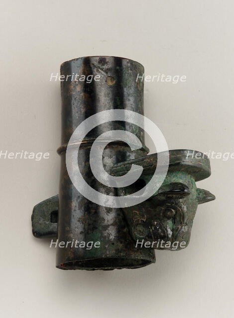 Axle cap with linchpin cast in the form of a feline head, Zhou dynasty, 1050-221 BCE. Creator: Unknown.