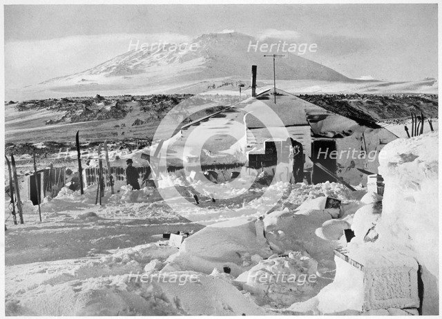 'In Winter Quarters Working on Maps and Records', Antarctica, 1911-1912. Artist: Herbert Ponting