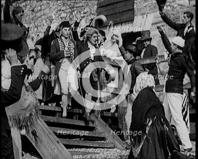 Scene from the Feature Film 'Nelson': Crowds of Actors in Period Costume Lining the..., 1920s. Creator: British Pathe Ltd.