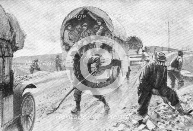 'A L'arriere de Verdun; Sur la route de Bar a Verdun, le passage continu des..., 1916 (1924) Creator: Georges Bertin Scott.