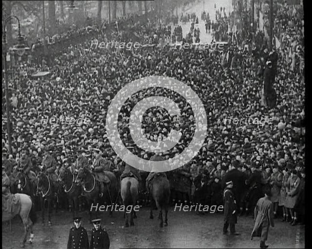 Crowd Watching the Funeral Procession of George V, His Majesty The King, 1936. Creator: British Pathe Ltd.