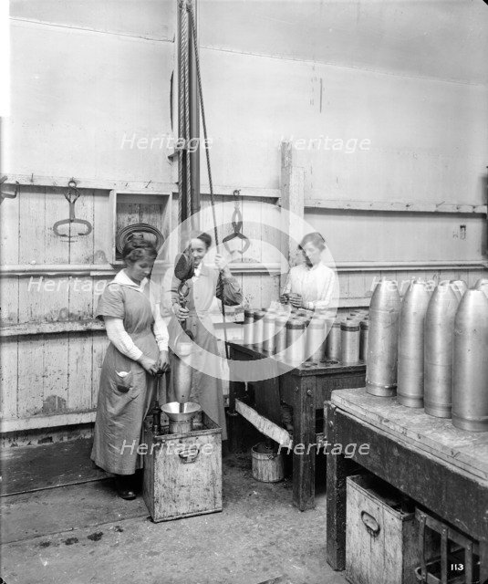 Checking Shells, Cunard Shell Works, Birkenhead, Merseyside, 1917.  Artist: Bedford Lemere and Company