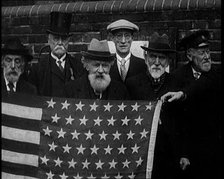 A Group of American Civil War Veterans Stand Together Holding the American Flag, 1924. Creator: British Pathe Ltd.