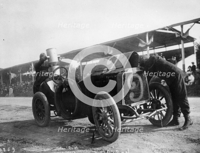 Garcet refuelling his Mors, Coppa Florio, Bologna, Italy, 1908. Artist: Unknown