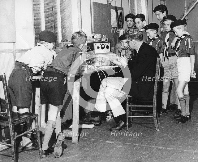 Boy scouts learning radio transmitting, 1960s.