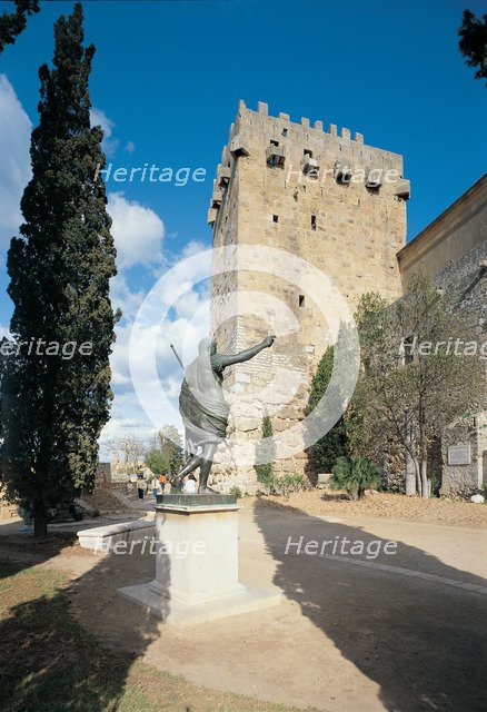 Archbishop tower 197 ad.C and statue of Emperor Augustus alongside the city walls built by the Ro…