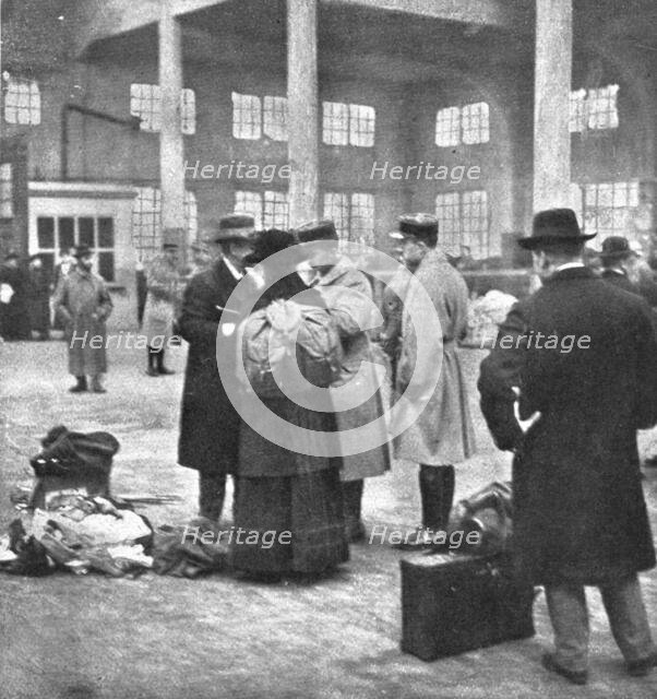 'Les Indesirables; Examen des pieces d'identite d'un professeur d'une ecole de Mulhouse..., 1918. Creator: Unknown.