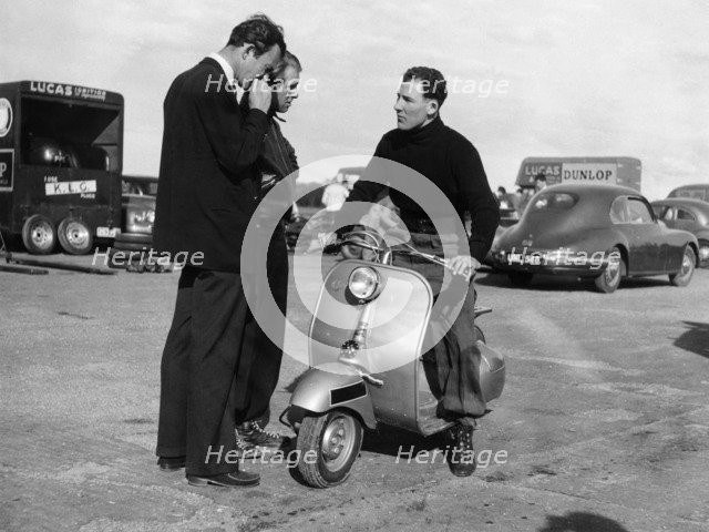 Stirling Moss on a Vespa scooter, Goodwood, April 1952. Artist: Unknown