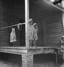 Children of turpentine worker near Cordele, Alabama, 1936. Creator: Dorothea Lange.