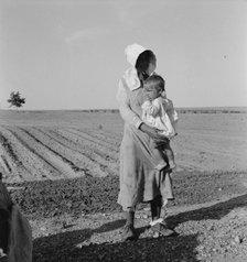 Mother and child of flood refugee family, near Memphis, Texas, 1937. Creator: Dorothea Lange.