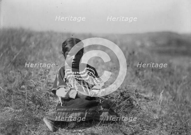 Running Owl's daughter, c1910. Creator: Edward Sheriff Curtis.