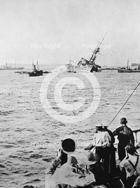 'The Majestic sinking after being torpedoed by an enemy submarine', 1915. Artist: Unknown.