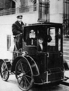 Woman passenger in a 1910 taxi cab, New York, USA, (c1910?). Artist: Unknown