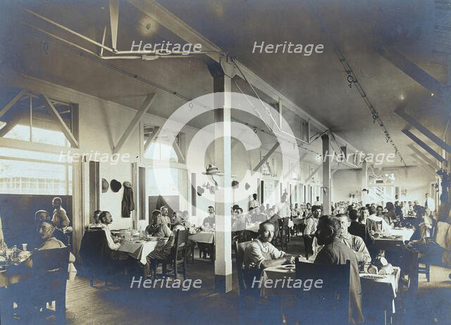 Panama Canal construction workers (American and European) dining in the Isthmian Canal..., c1910. Creator: Unknown.