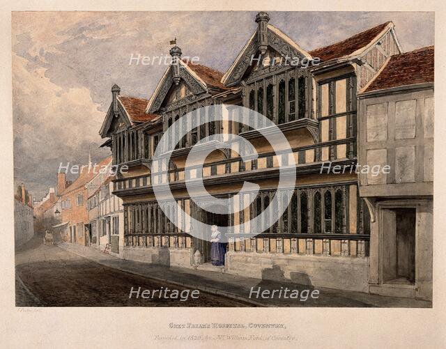 Ford's Hospital (Greyfriars' Hospital), Coventry: a woman standing at the entrance, c1840s.. Creator: Edward Pretty.