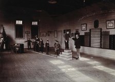 Metropolitan Lunatic Asylum, Kew, Victoria (Australia): boys walking along a ladder laid upon... Creator: Unknown.