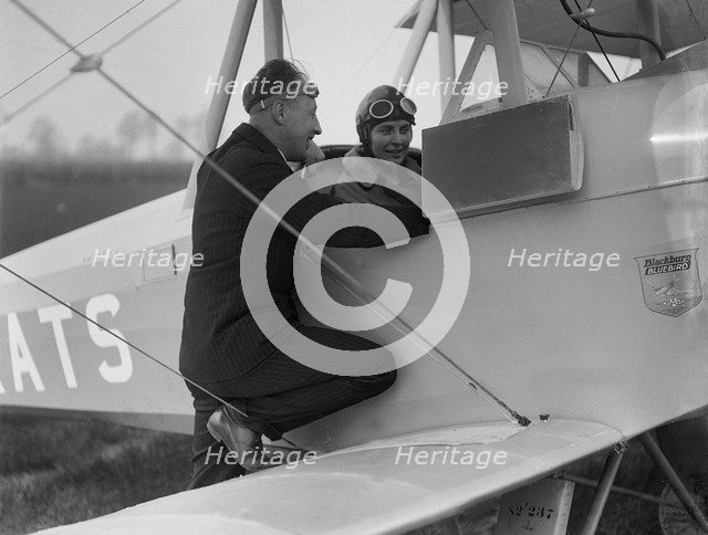 Kitty Brunell in the cockpit of a Blackburn Bluebird aeroplane, c1930s. Artist: Bill Brunell.