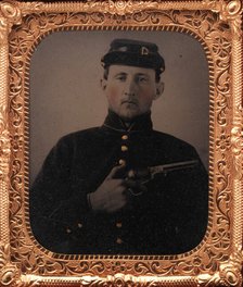 Union Soldier with Colt Revolver, in Studio, 1861-65. Creator: Unknown.