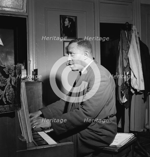 Portrait of Willie Smith in his apartment, Manhattan, New York, N.Y., ca. Jan. 1947. Creator: William Paul Gottlieb.