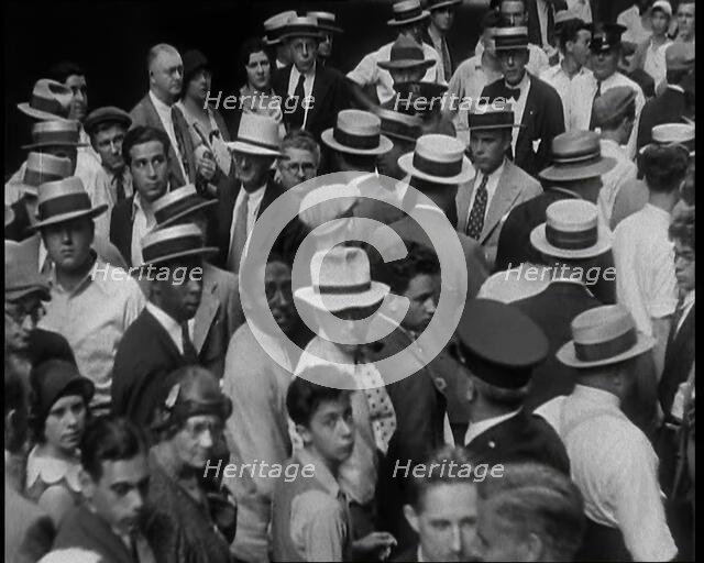 People Walking Around on a Crowded Street, 1930s. Creator: British Pathe Ltd.