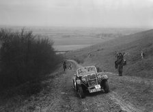 Singer 2-seater sports competing in a trial, Crowell Hill, Chinnor, Oxfordshire, 1930s. Artist: Bill Brunell.