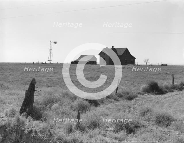 Abandoned farmhouse in the Columbia Basin, one mile east of Quincy, Grant County, Washington, 1939. Creator: Dorothea Lange.