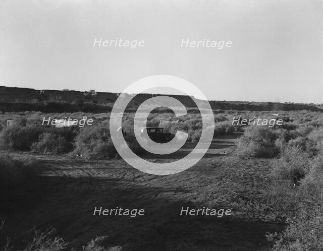 California migratory farm laborers, outskirts of Brawley, Imperial Valley, California, 1937. Creator: Dorothea Lange.