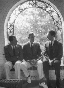 Brady, Mosely, and Scott group, seated in a window, 1930 May 24. Creator: Arnold Genthe.