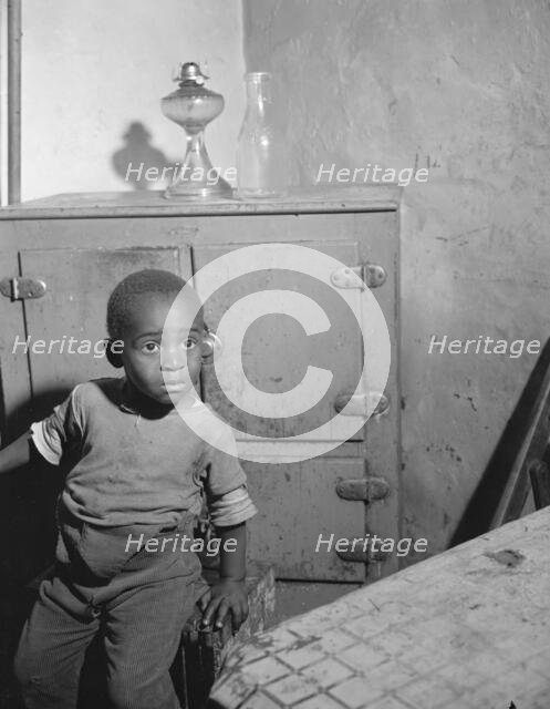 A young boy who lives near the nation's capitol, Washington, D.C., 1942. Creator: Gordon Parks.