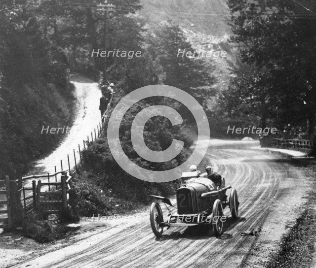 AL Guinness in a Sunbeam, Isle of Man TT race, 1914. Artist: Unknown