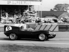 Duncan Hamilton driving a Jaguar D type, RAC Tourist Trophy, Goodwood, Sussex, 1958. Creator: Unknown.