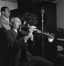 Portrait of Sidney Bechet and Lloyd Phillips, Jimmy Ryan's (Club), New York, N.Y., ca. June 1947. Creator: William Paul Gottlieb.