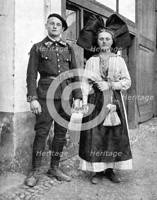 Couple in traditional dress, Alsace-Lorraine, Rhine, 1936.Artist: Donald McLeish