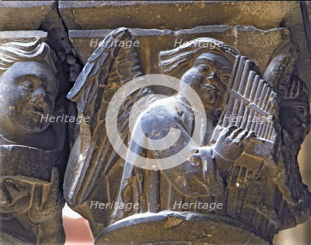 Capital of one of the Gothic galleries of the cloister built between (1387 - 1401) representing a…