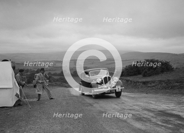 Standard saloon of Mrs SH Richards competing in the South Wales Auto Club Welsh Rally, 1937 Artist: Bill Brunell.